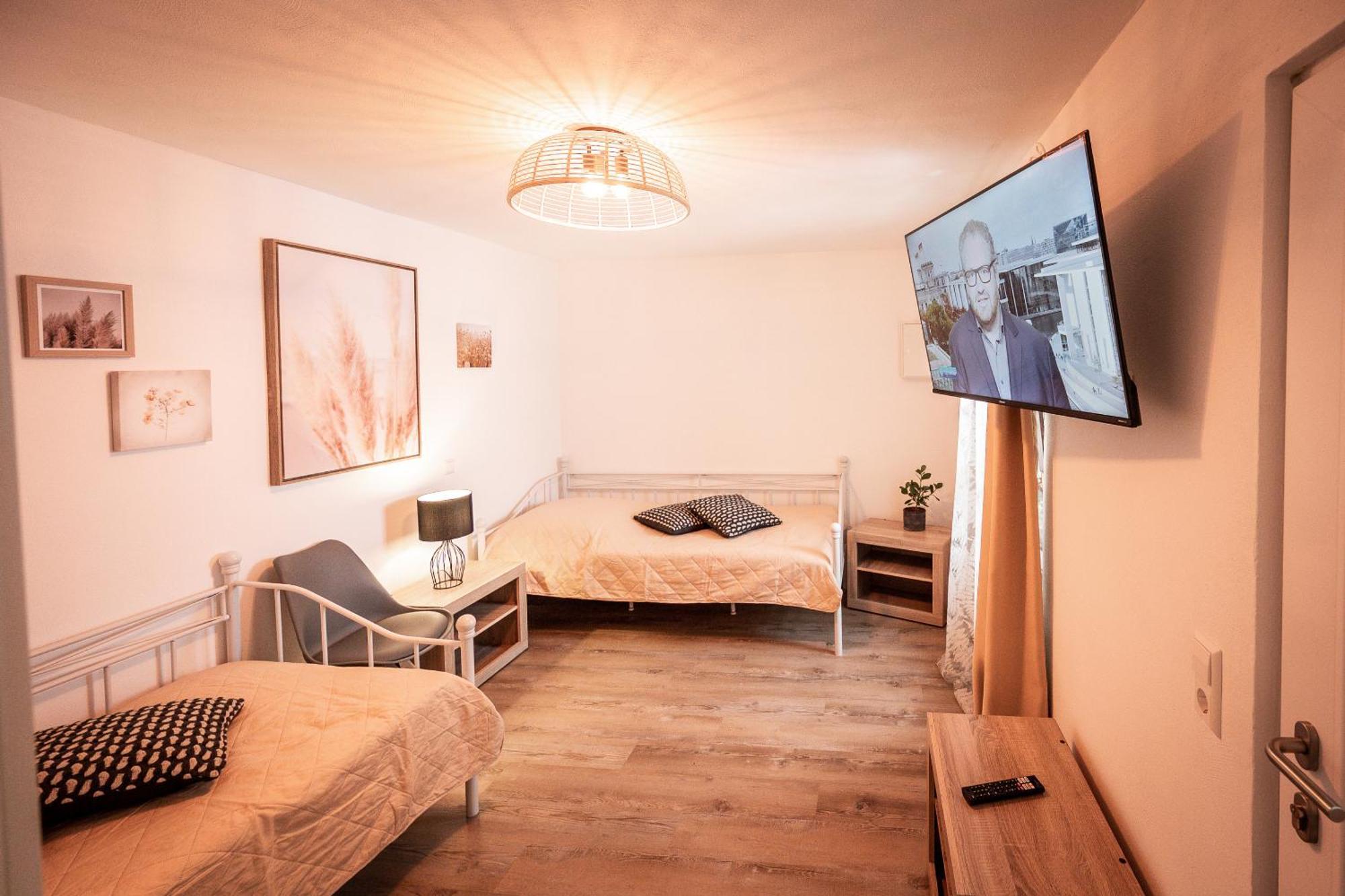 Gaestehaus & Weingut Gehrig Weisenheim am Sand Pokoj fotografie